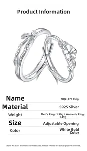 Detail view of S925 sterling silver couple rings with floral camellia leaf design