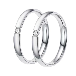 Elegant silver-toned titanium steel rings featuring a single sparkling crystal for women