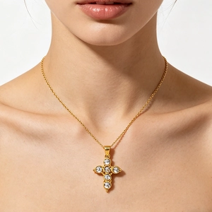 Elegant 18K gold plated stainless steel cross necklace with six sparkling zircon stones