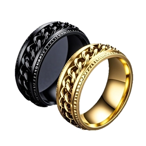 Anillos giratorios de acero inoxidable en negro y dorado con diseño de cadena para hombre