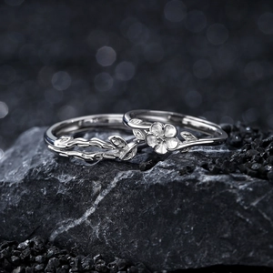 925 Sterling silver camellia flower open rings for couples on black textured stone