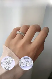 Detailed view of hand-polished silver geometric ring with cubic zirconia inlay details