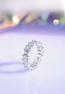 Detailed macro view of S925 sterling silver stamp on square-cut zircon eternity ring