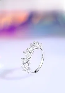 Detailed side view of S925 sterling silver ring with multi-cut sparkling zircon stones