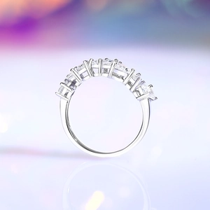 Elegant S925 silver eternity ring with seven sparkling round zircon stones on a white base