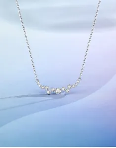 Close-up of S925 silver smiley necklace featuring sparkling micro-pave cubic zirconia crystals