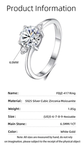 Detailed view of S925 sterling silver stamp on three-stone moissanite ring band