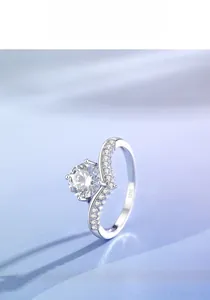 Macro shot of 925 silver ring featuring crown design with sparkling moissanite stone