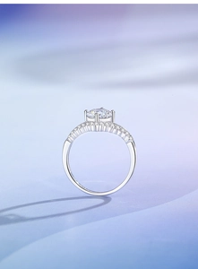 Close-up of a 925 sterling silver crown ring with a round moissanite stone in 4-prong setting