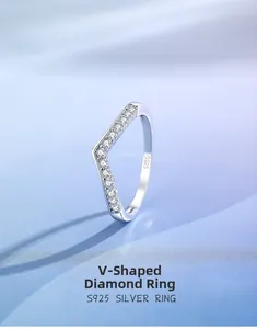 Macro detail of V-shaped S925 sterling silver ring with small brilliant zircons