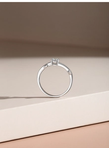 Detailed view of the four-prong setting and side leaf engraving on the S925 silver ring