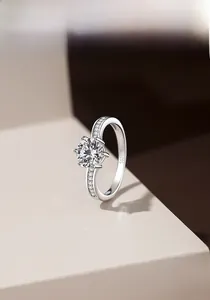 Detailed view of S925 silver ring featuring a six-prong moissanite and side stones