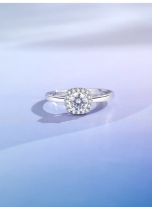 Macro shot of silver S925 sterling silver halo ring with large round moissanite stone