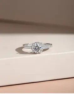 Macro shot of S925 silver halo ring featuring brilliant moissanite and pave setting