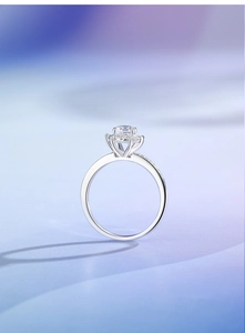 Detailed macro shot of a six-prong crown VVS1 moissanite ring set in S925 sterling silver