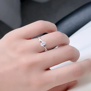 S925 Sterling silver leaf branch ring with oval center stone worn on finger