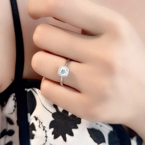 Classic S925 sterling silver ring featuring a 0.5 carat cushion-cut moissanite halo setting