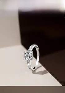 Macro shot of S925 sterling silver ring showing the hallmark and halo diamond setting