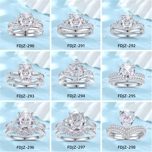 Nine S925 sterling silver bridal ring sets with oval and round cubic zirconia stones