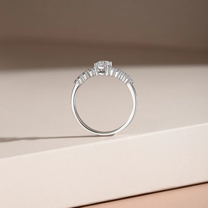 Luxurious S925 sterling silver ring with brilliant zircon centerpiece on beige stand