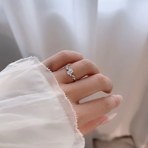S925 silver ring with rectangular zircon and asymmetric diamonds on model hand