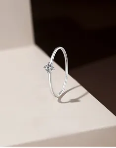 Macro detail of S925 sterling silver ring showing the hallmark and cz stone setting