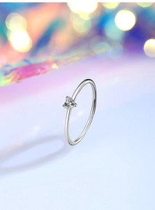Detail of S925 silver 1mm band ring showing heart zircon and hallmark engraving