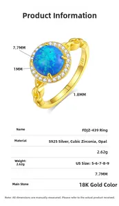 Detail view of gold-plated 925 silver ring featuring blue opal and chain design shank