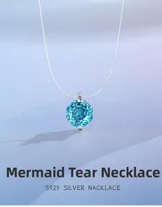 Detailed shot of octagon cut aquamarine pendant on a fine S925 sterling silver chain
