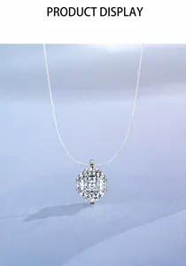 Macro detail of octagonal rose-cut crystal pendant on transparent fishing line chain