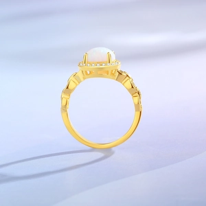 Vintage 925 silver gold-plated ring with white opal stone and pavé accents