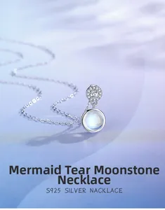 Macro shot of S925 sterling silver moonstone pendant with sparkling pavé zircons
