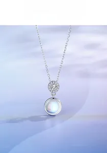 Macro shot of S925 silver double circle pendant necklace with blue moonstone center