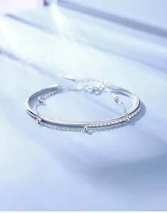 Detail of S925 sterling silver double layer bracelet with beads and half-pave crystals