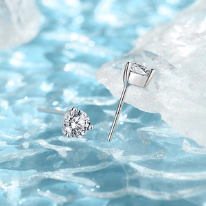 Classic S925 sterling silver four-prong stud earrings with round cubic zirconia on ice