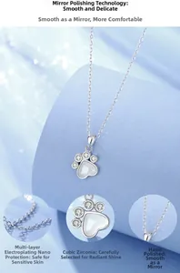 Detail of S925 silver cat paw necklace with white chalcedony and cubic zirconia