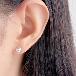 Classic three-prong sterling silver stud earrings with a 5mm brilliant round diamond