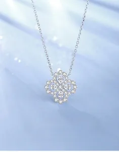 Close-up of S925 sterling silver four-leaf clover pendant with pear-cut cubic zirconia