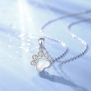 S925 silver cat paw necklace featuring a white heart-shaped chalcedony and fine diamonds