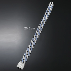 Iced out Cuban link bracelet for men with silver finish and blue cubic zirconia stones