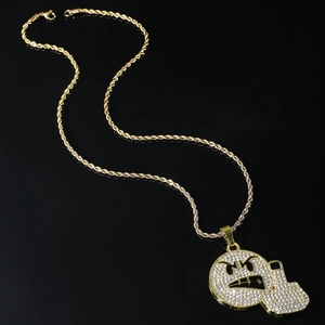 Hip hop gold rope chain with iced out angry emoji pendant and glittering rhinestones