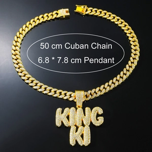 Macro shot of icy iced-out KING KI pendant with 50cm Cuban link chain dimensions