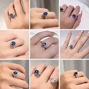 S925 sterling silver rings with radiant cut royal blue sapphire stones in grid view