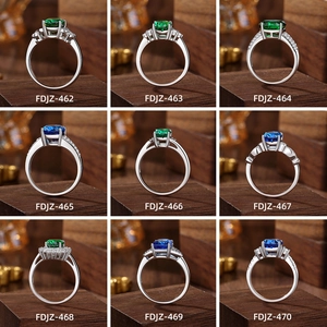 Collection of S925 sterling silver rings featuring emerald and royal blue sapphire gemstones