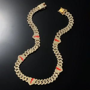 Hip hop gold Cuban link necklace with iced out rhinestones and red broken heart accents