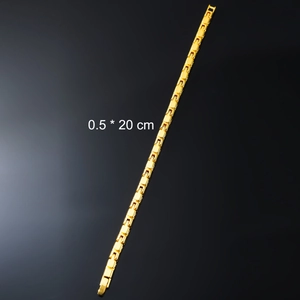 Macro shot of 0.5 x 20 cm gold interlocking rectangular link bracelet on black background