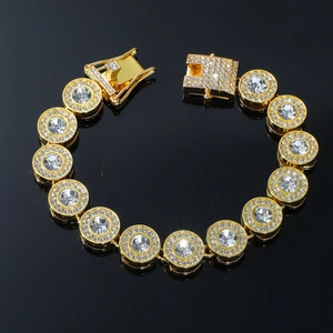 Detailed close-up of iced out gold plated hip hop bracelet with sparkling round zircons
