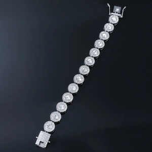 Close-up of hip hop tennis bracelet with silver round-cut stones and crystal halo box clasp