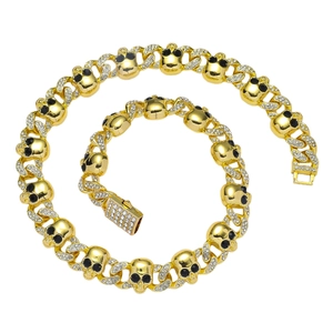 Collier tête de mort doré pour homme style hip-hop avec pierres noires et cristaux blancs