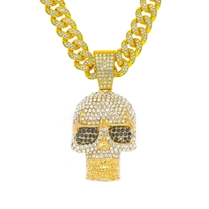 Hip hop skull pendant necklace with white diamonds and gold Cuban chain on white background